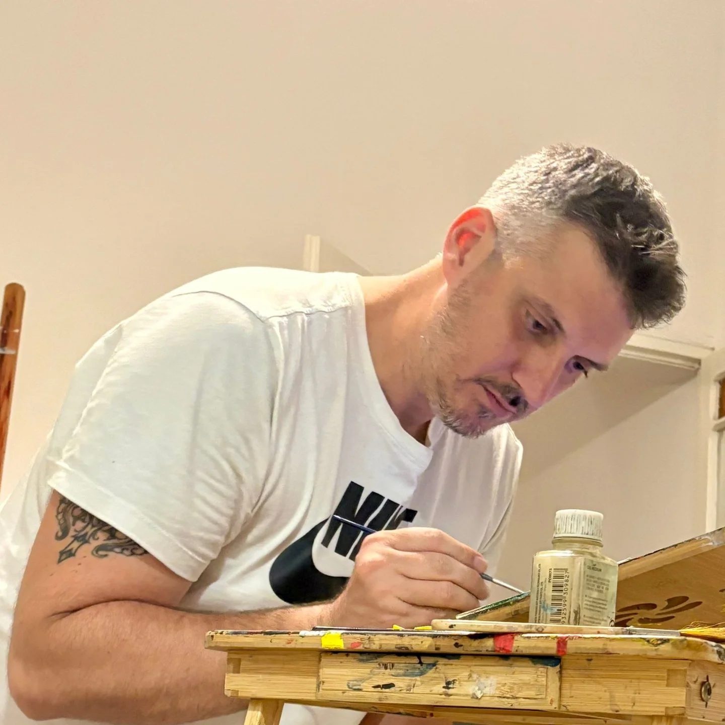 Helias Fylactos working on a painting